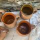 set of terracotta jugs country style