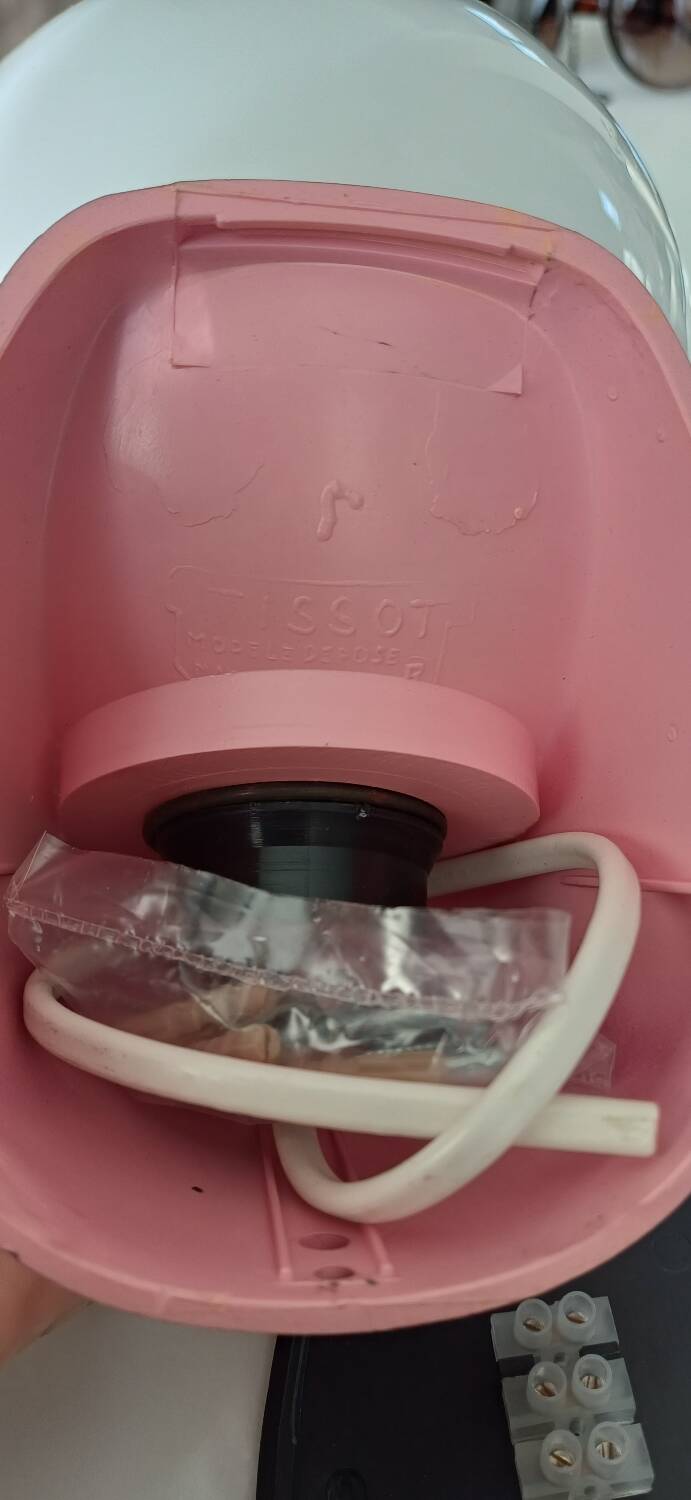 Pair of Tissot wall lights from the 70s with pink opaline glass in space age style.