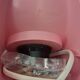 Pair of Tissot wall lights from the 70s with pink opaline glass in space age style.