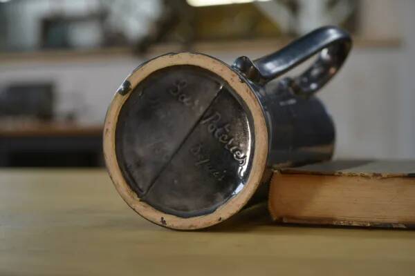 Black ceramic pitcher 1950s