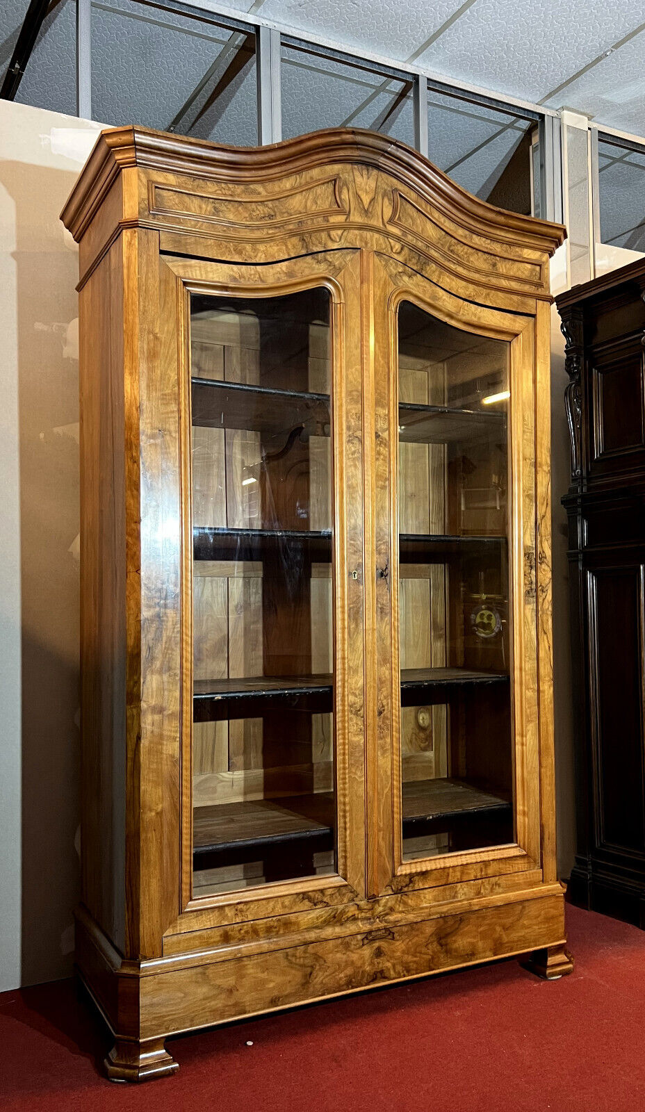 Library with gendarme's hat Louis Philippe era in blond walnut around 1830