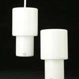 Deux pendentifs Holmegaard, modèle Two-Way. En verre opale soufflé à la bouche