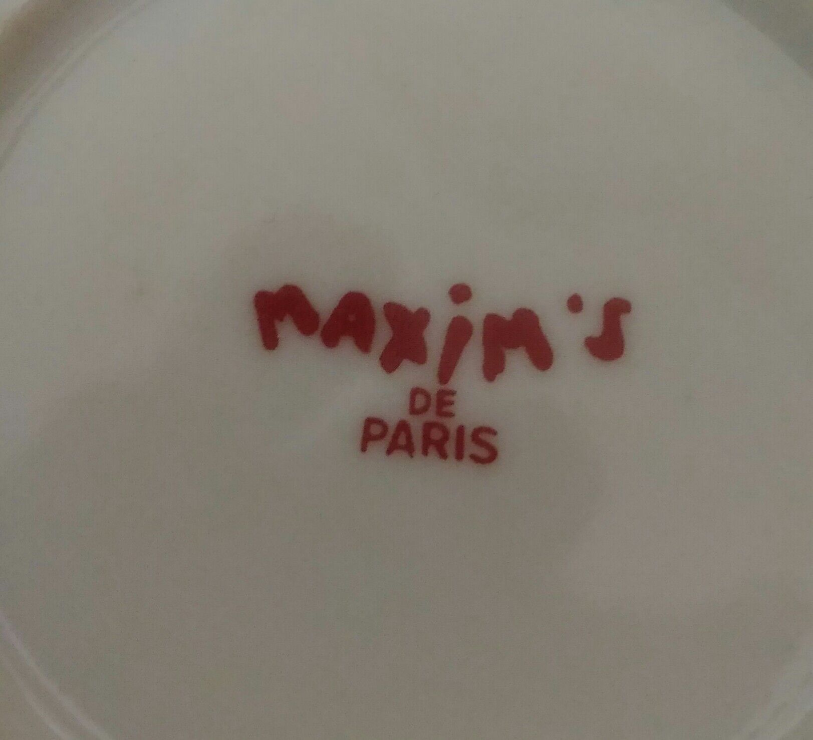 2 coffee cups with 2 porcelain saucers maxim's de paris