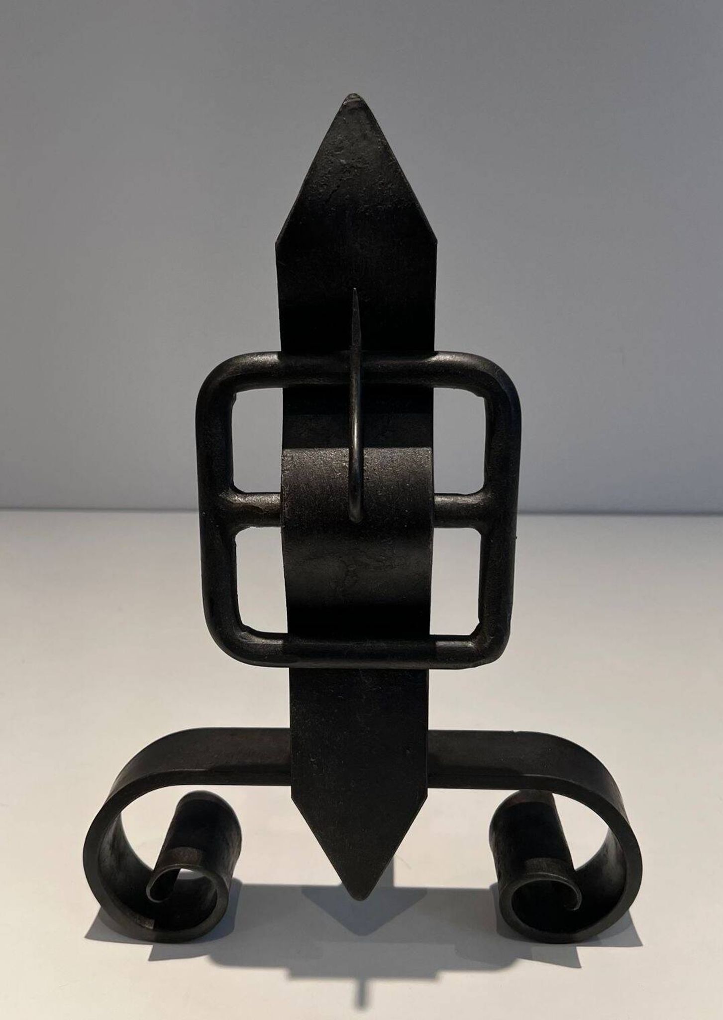 Pair of Wrought Iron Andirons with Obelisk and Belt Motifs