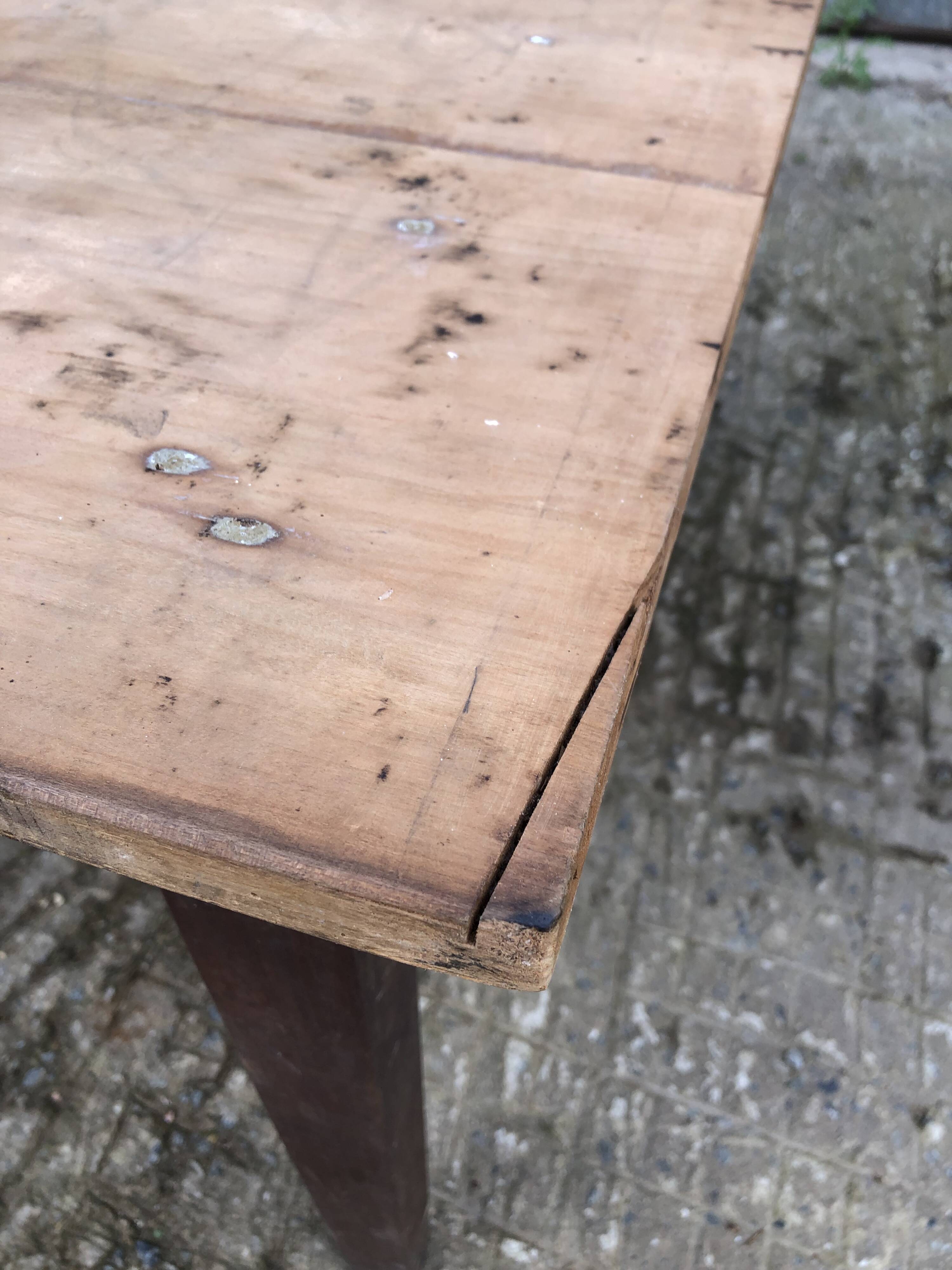 Rustic antique farmhouse table in solid cherry wood.