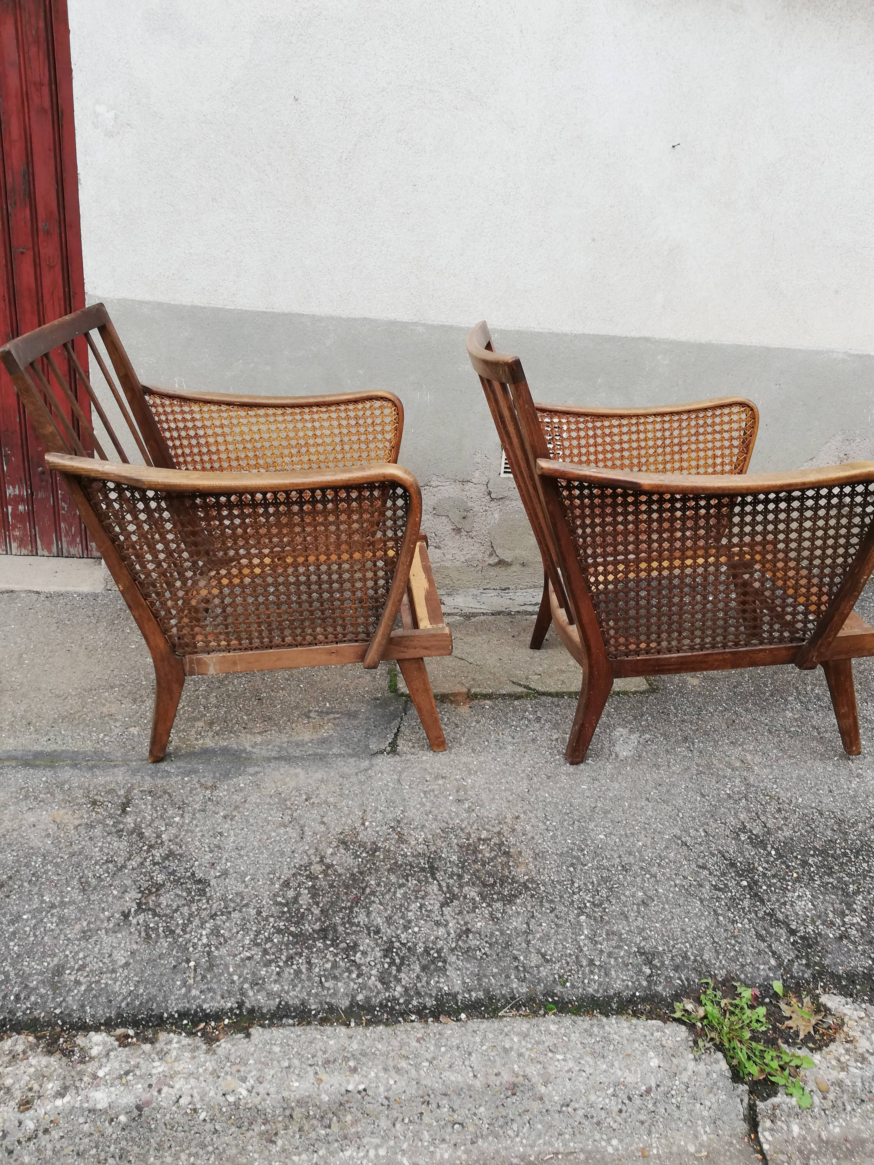 Paire de fauteuils vintage pieds compas et cannage