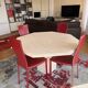 Table octogonale en travertin 130 cm Artelano état neuf