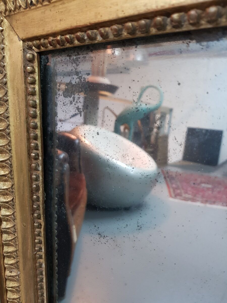 Antique french gilded Louis XVl mirror with mercury glass