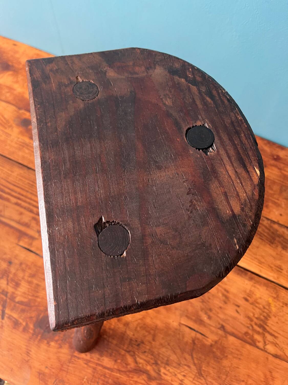 Wooden milking tripod stool