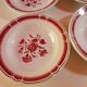 set of 11 vintage soup plates with red flowers