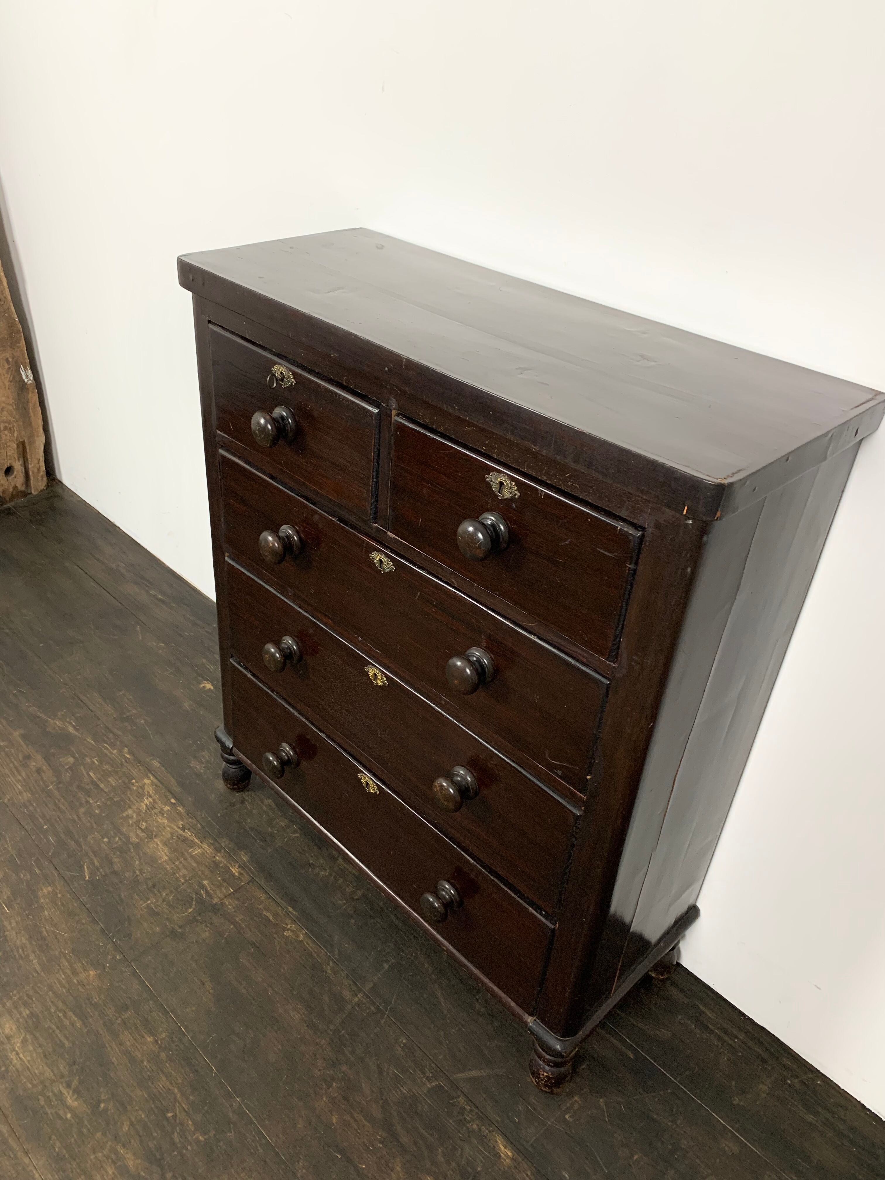 Dark antique chest of drawers