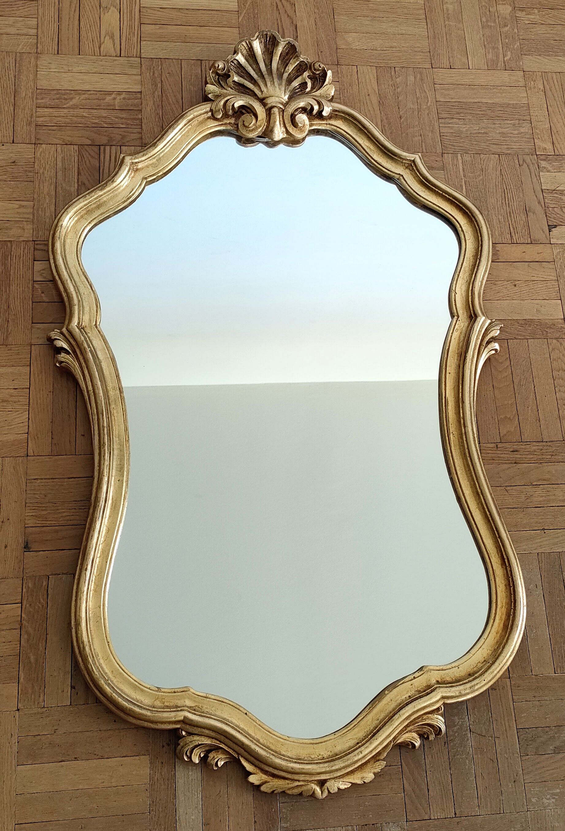 Large gilded mirror shell Louis XV style