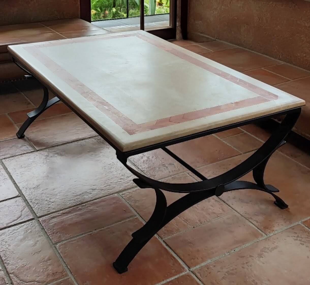 Character coffee table in stone marquetry and black metal.