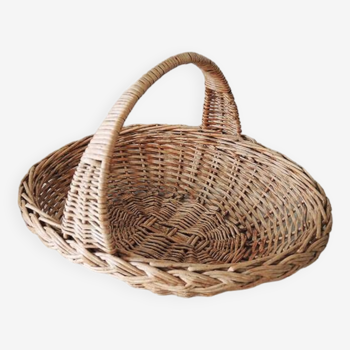 Old oval basket in light wicker