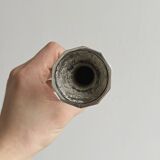 single flower vase or metal candlestick