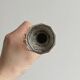 single flower vase or metal candlestick