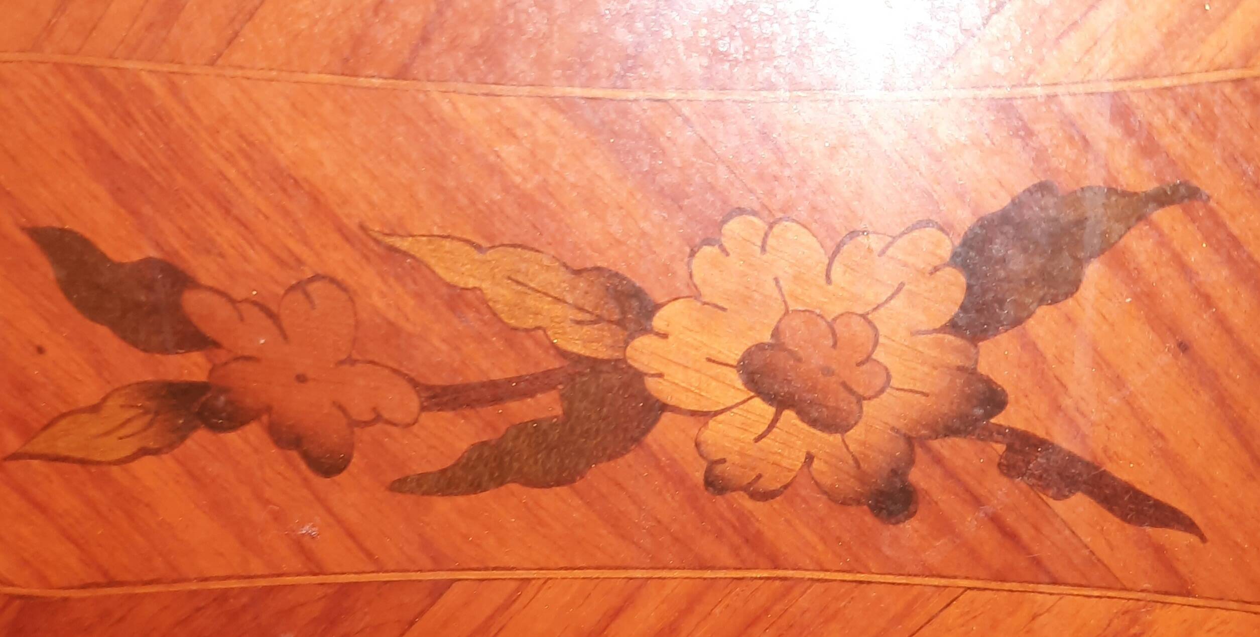 Flowered marquetry commode in Louis XV style