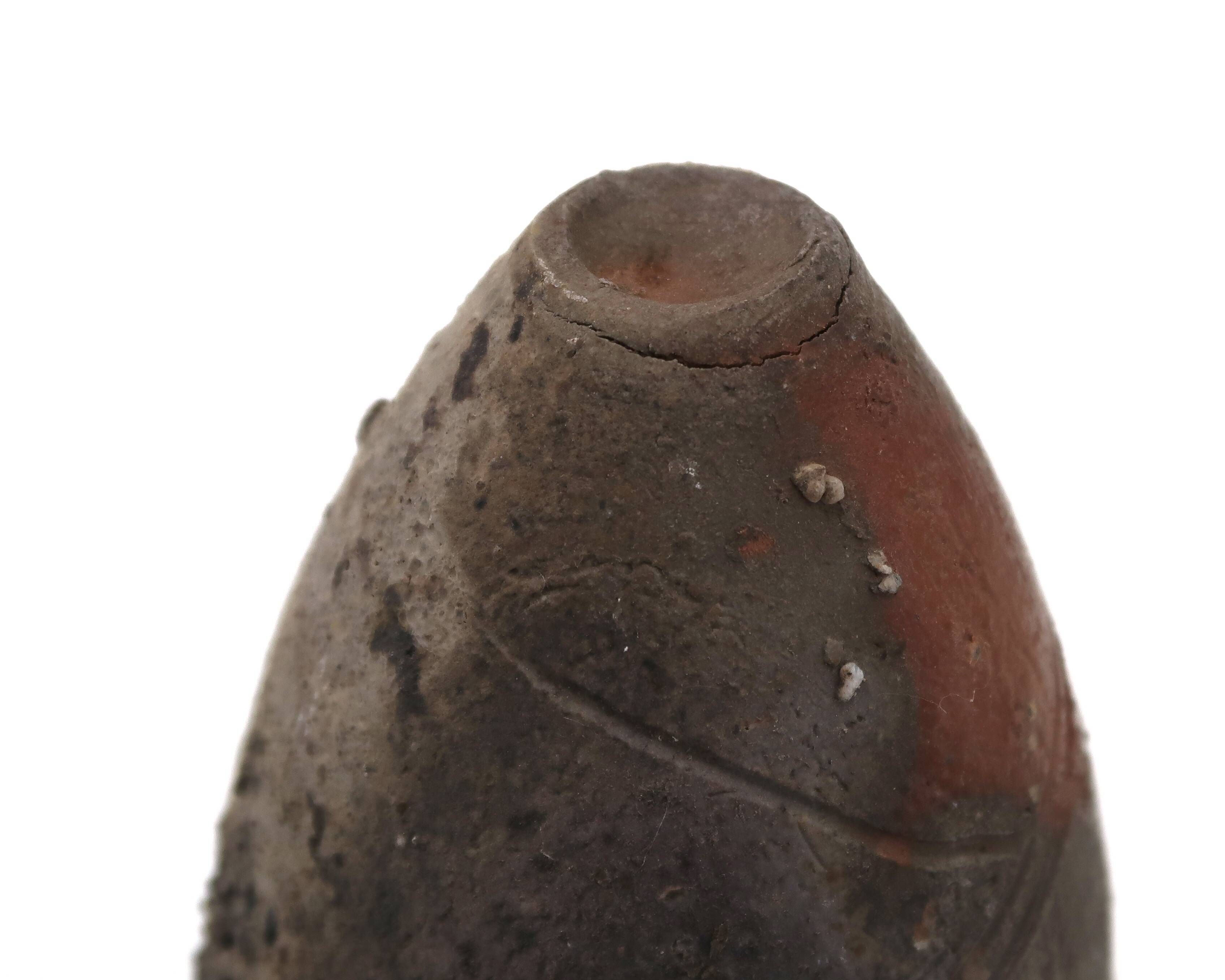 Sandstone sculpture by Eric Astoul, ceramic wood-fired kiln.