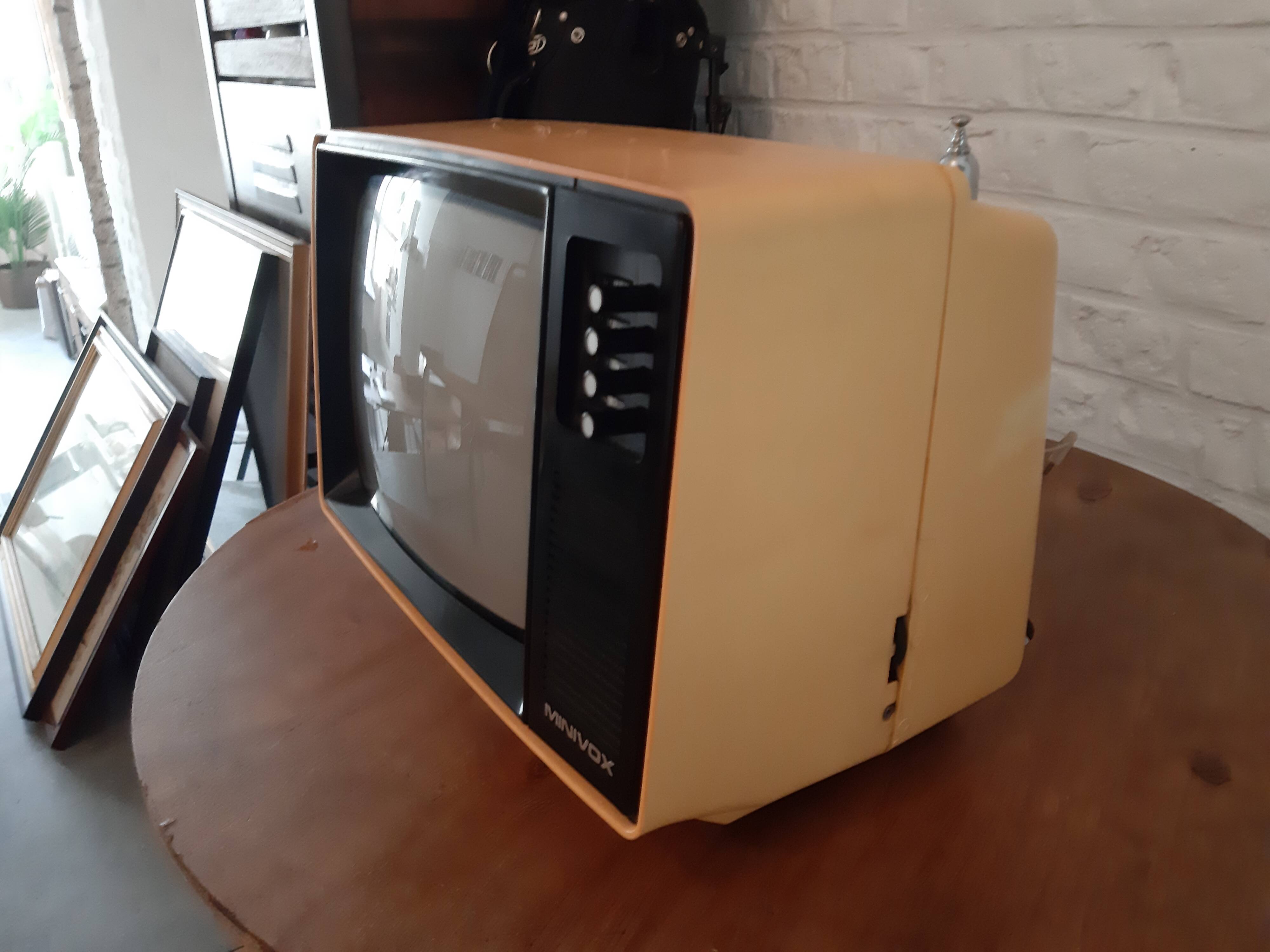 Yellow minivox vintage tv