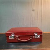 Red leather suitcase