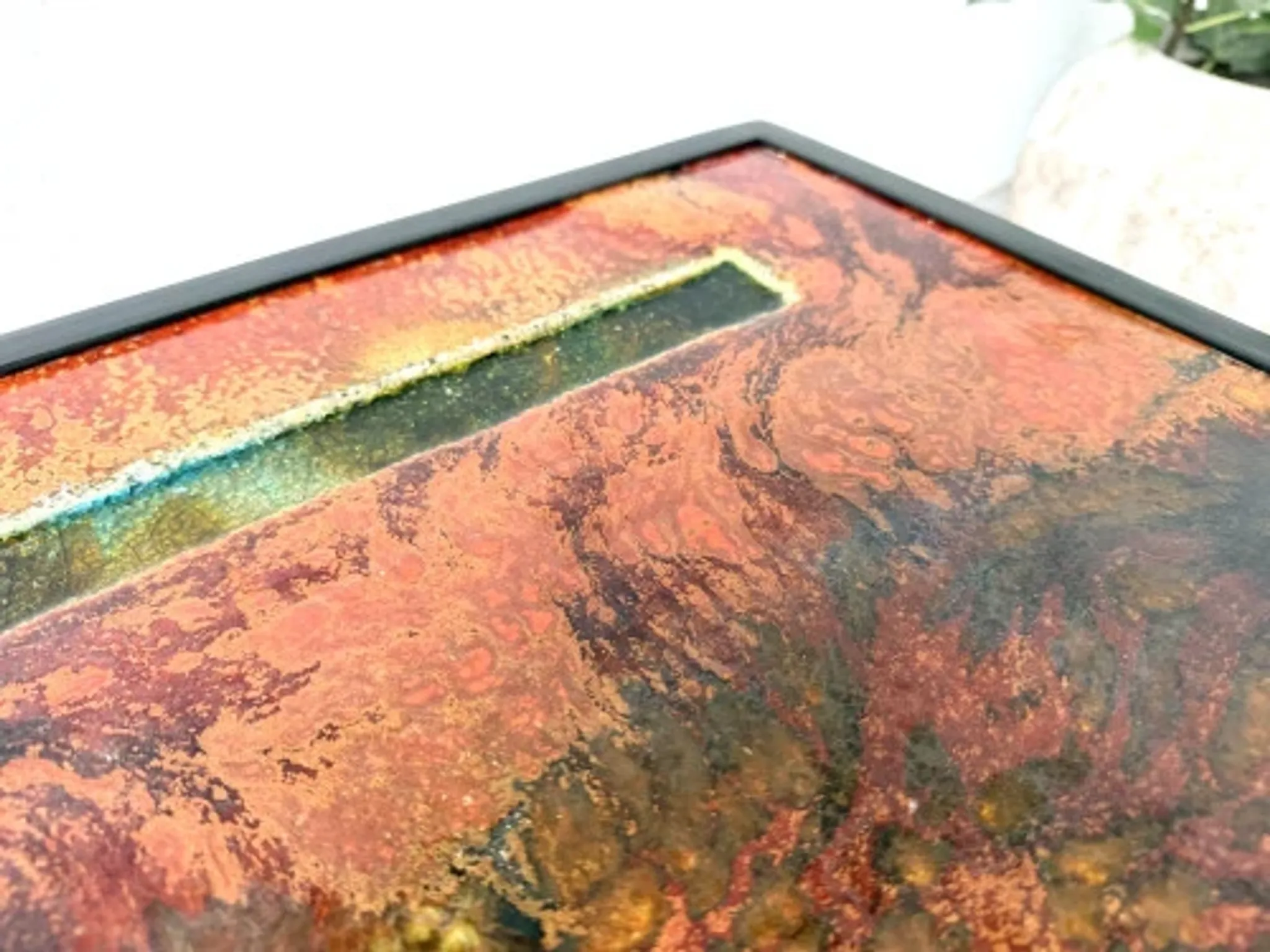 Coffee table by Robert and Jean Cloutier in enamelled lava and metal, 1950s.