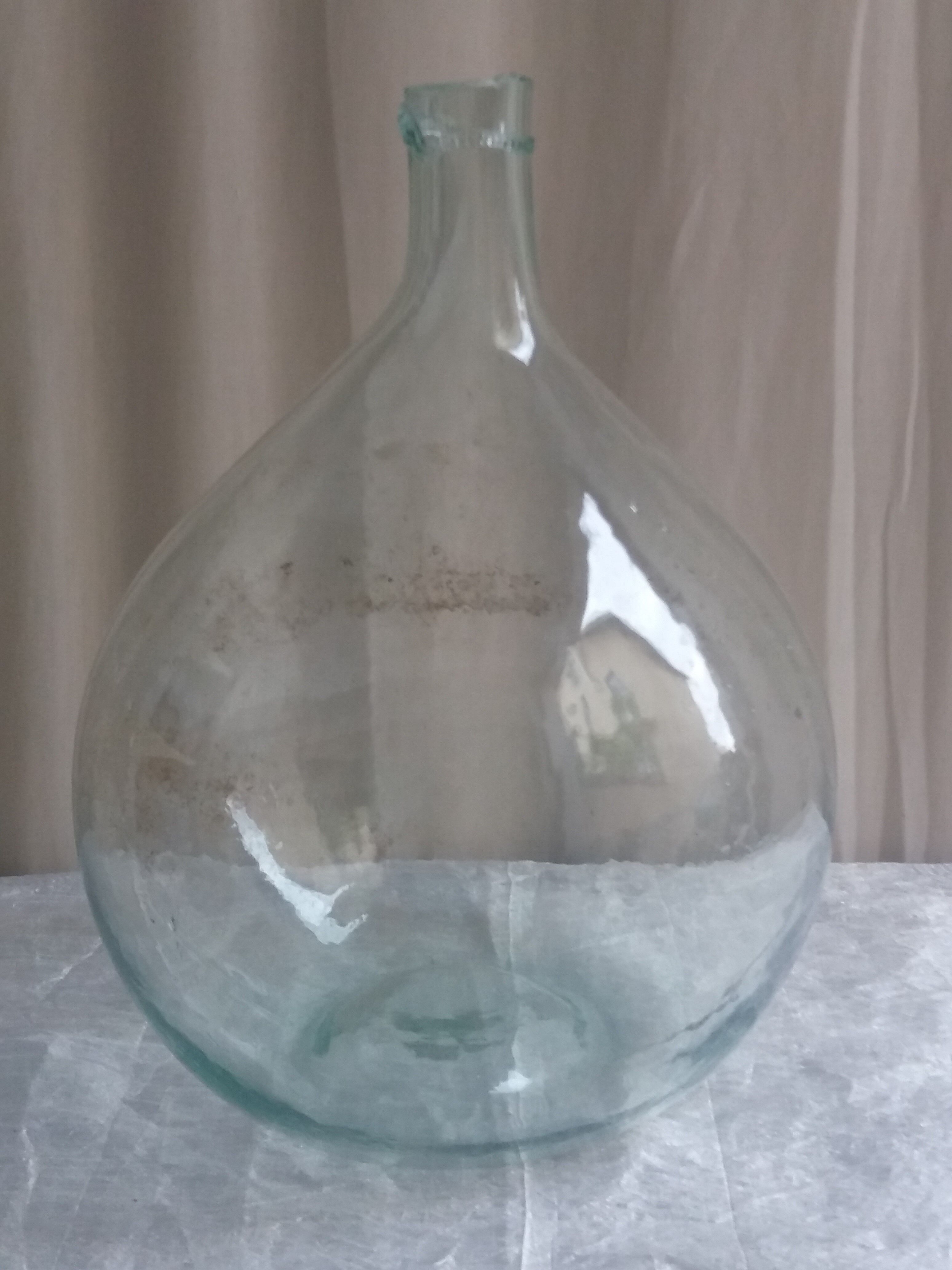 Demijohn in white glass