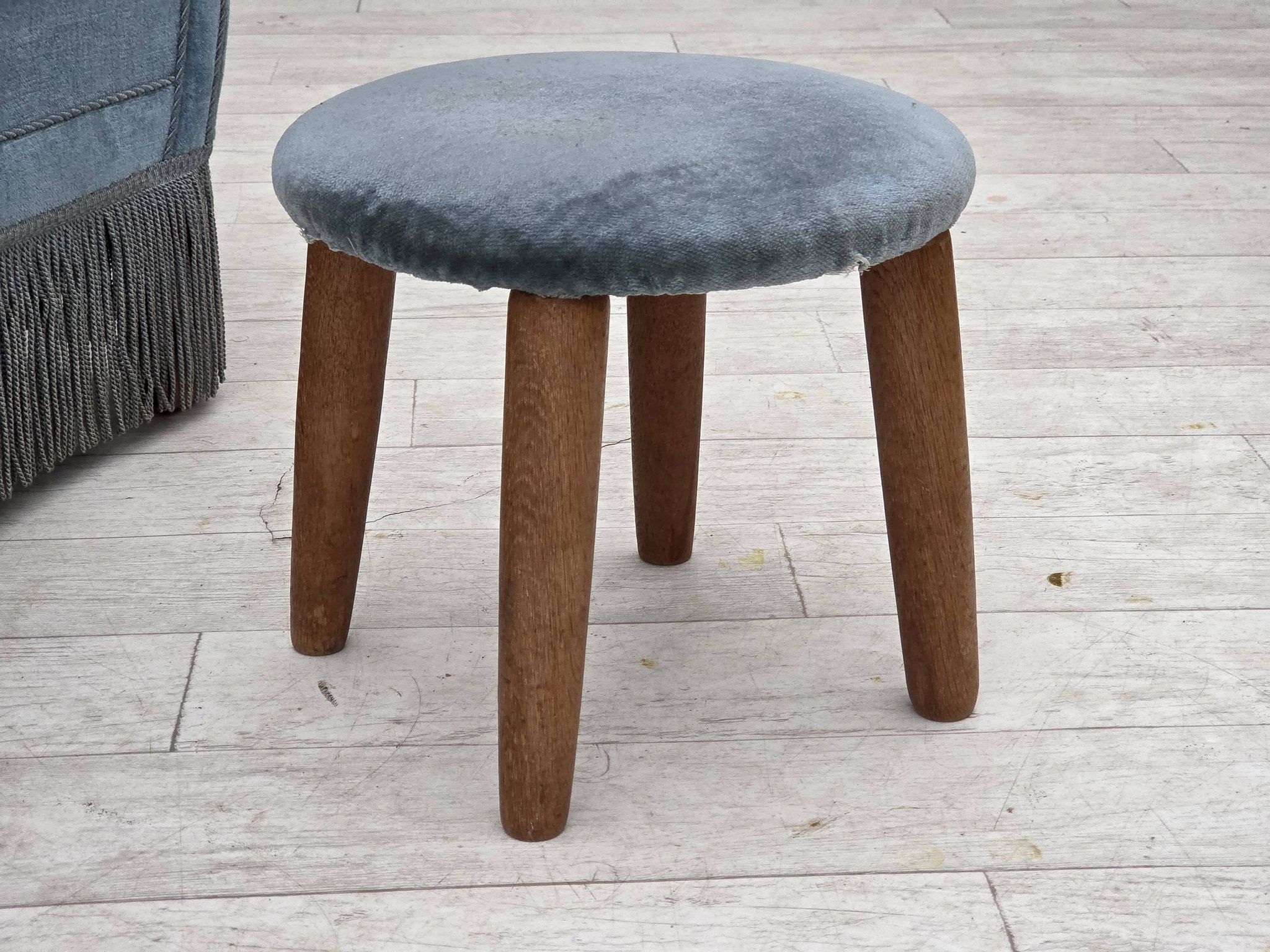 1970s, Danish armchair with footstool, blue furniture velour, oak wood legs