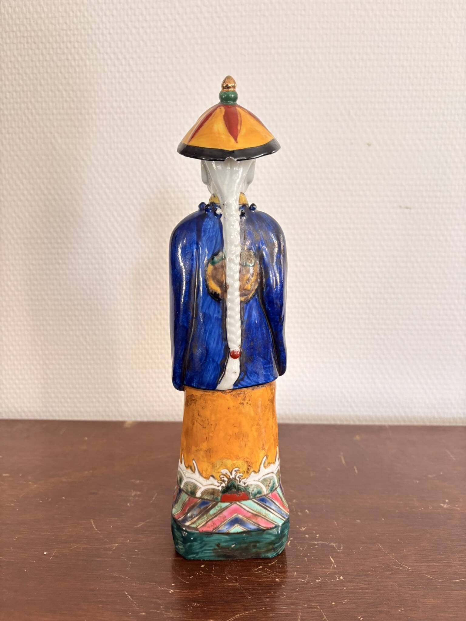Chinese Porcelain Sculpture of a Manchu Mandarin Qing Pipe Smoker