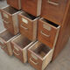 Office furniture has oak drawers 1950 brass handles and label holders