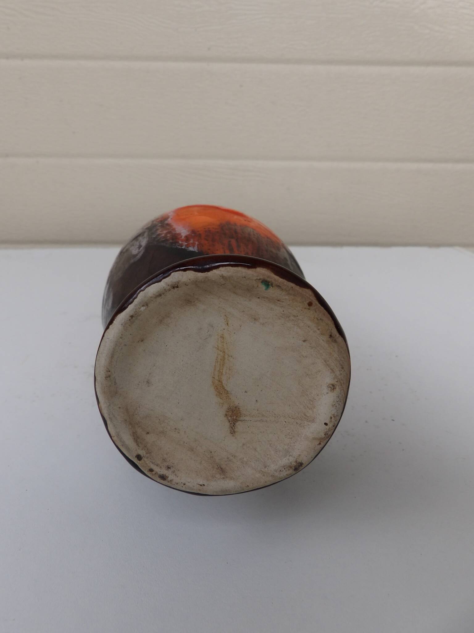 Vase with two orange handles
