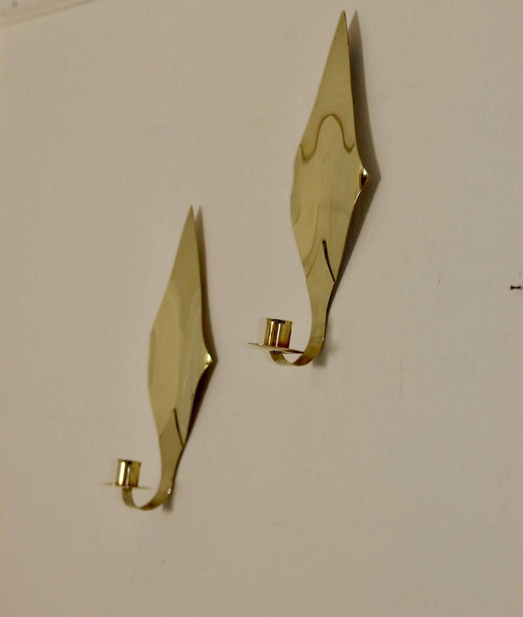 Pair of Swedish brass wall sconces from the mid-century.