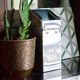 Vintage wall ashtray in shiny metal industrial style