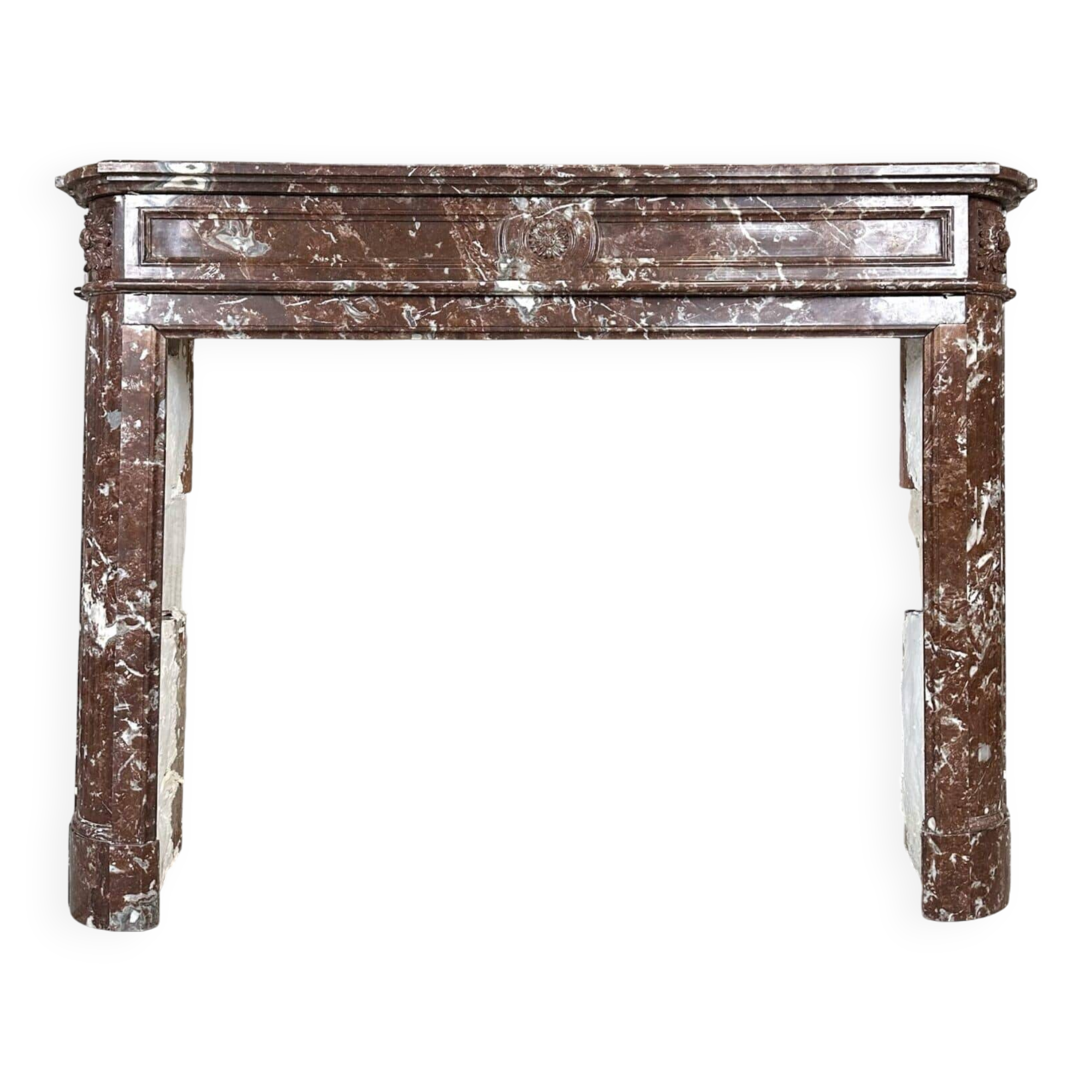 Red marble fireplace in the Louis XVI style, late 19th century