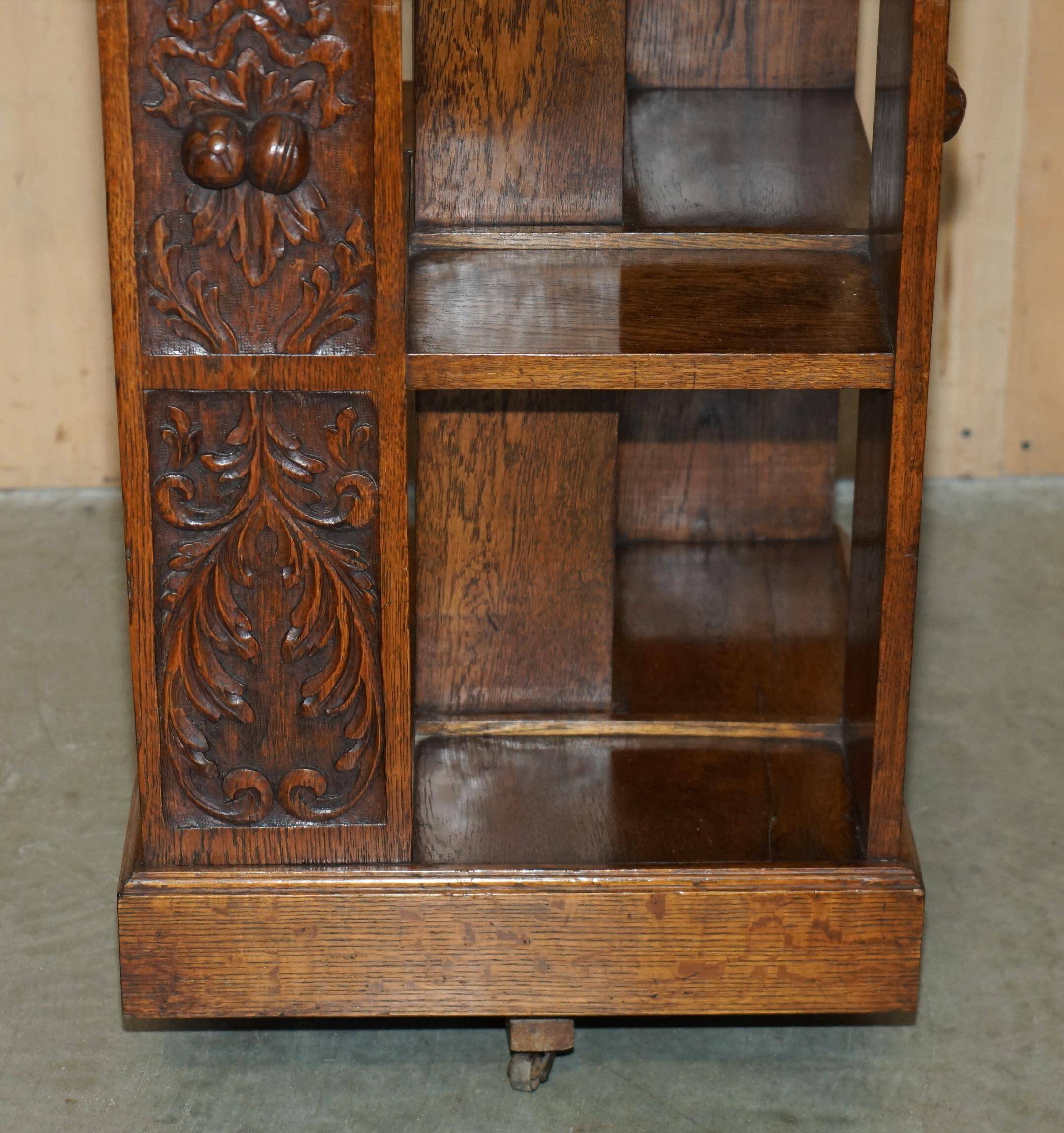 Victorian carved oak revolving library, circa 1880.