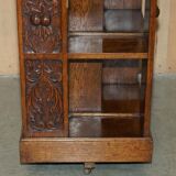 Victorian carved oak revolving library, circa 1880.