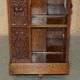 Victorian carved oak revolving library, circa 1880.
