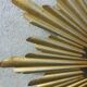 Gold metal sun mirror
