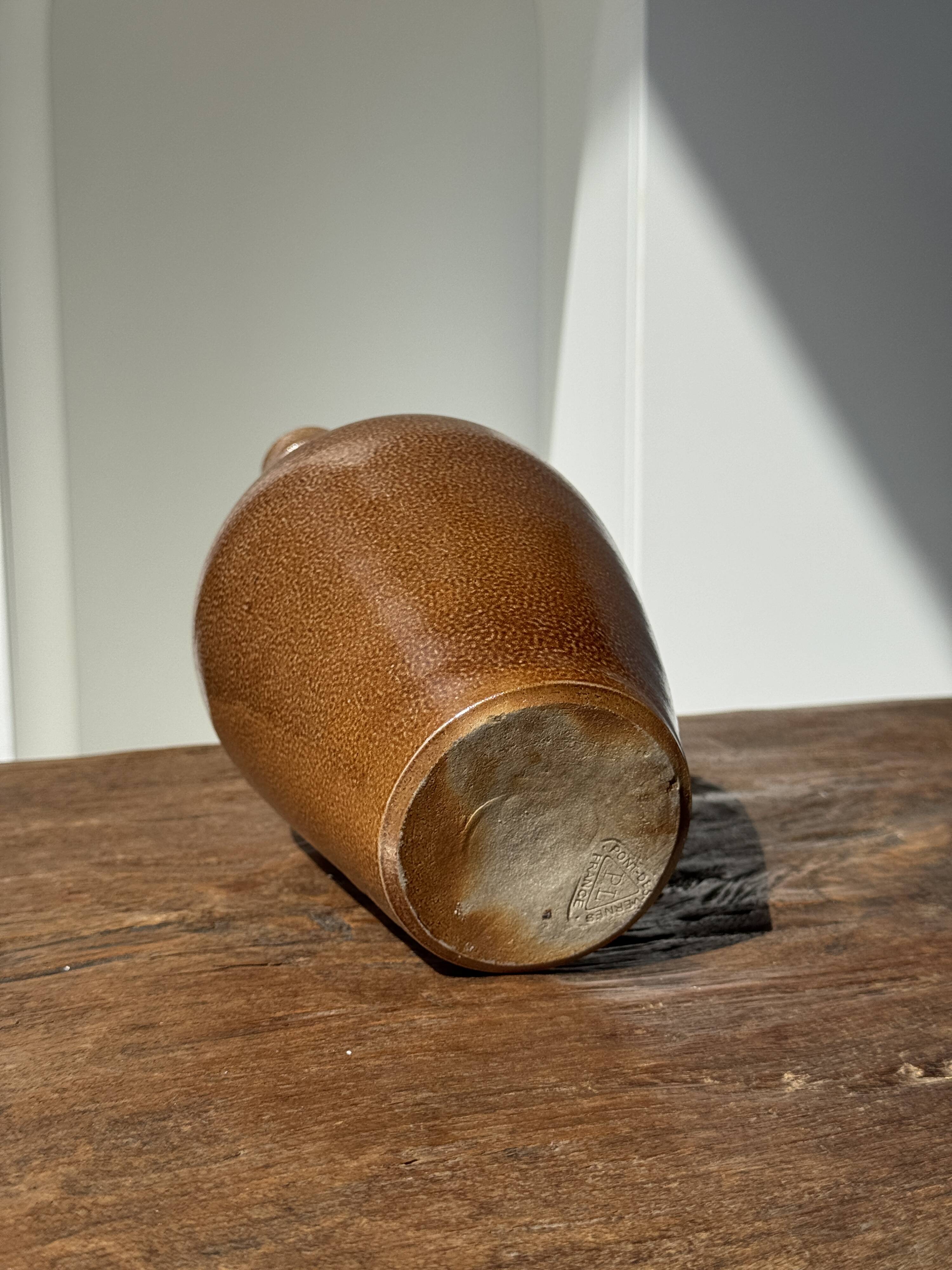 Sandstone demijohn in Pont des Vernes, France