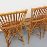 Set of 4 vintage Audoux Minet rattan chairs from the 1950s and 60s.