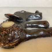 Iridescent ceramic elephant candlestick signed