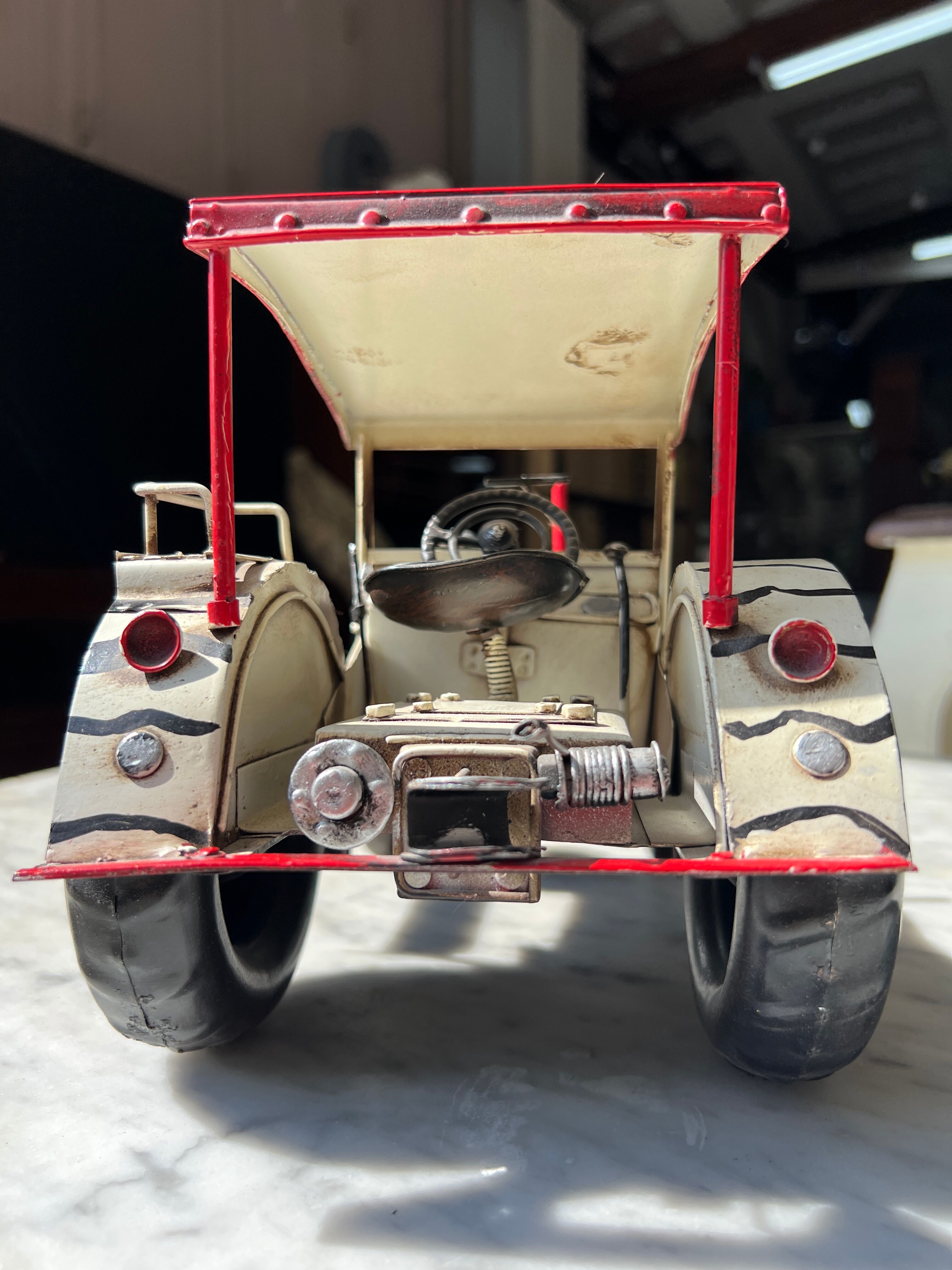 Old zebra metal tractor