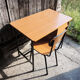 Vintage formica and metal desk with matching chair.