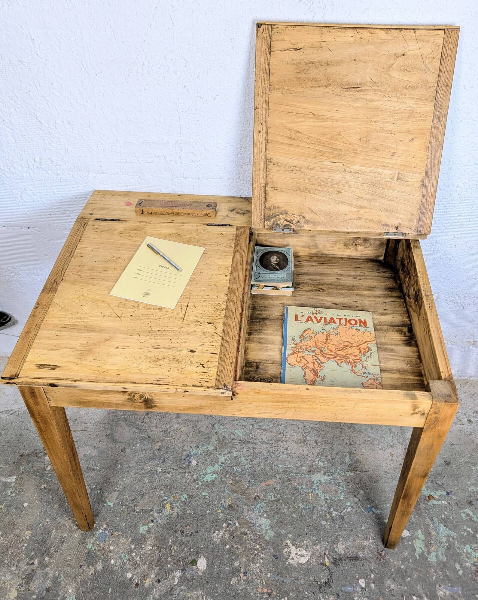 Antique wooden school desk with double lift-up tops.