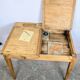 Antique wooden school desk with double lift-up tops.