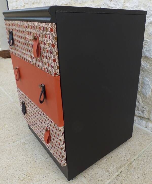 Three-drawer wooden and faux leather chest of drawers on wheels, completely refurbished.