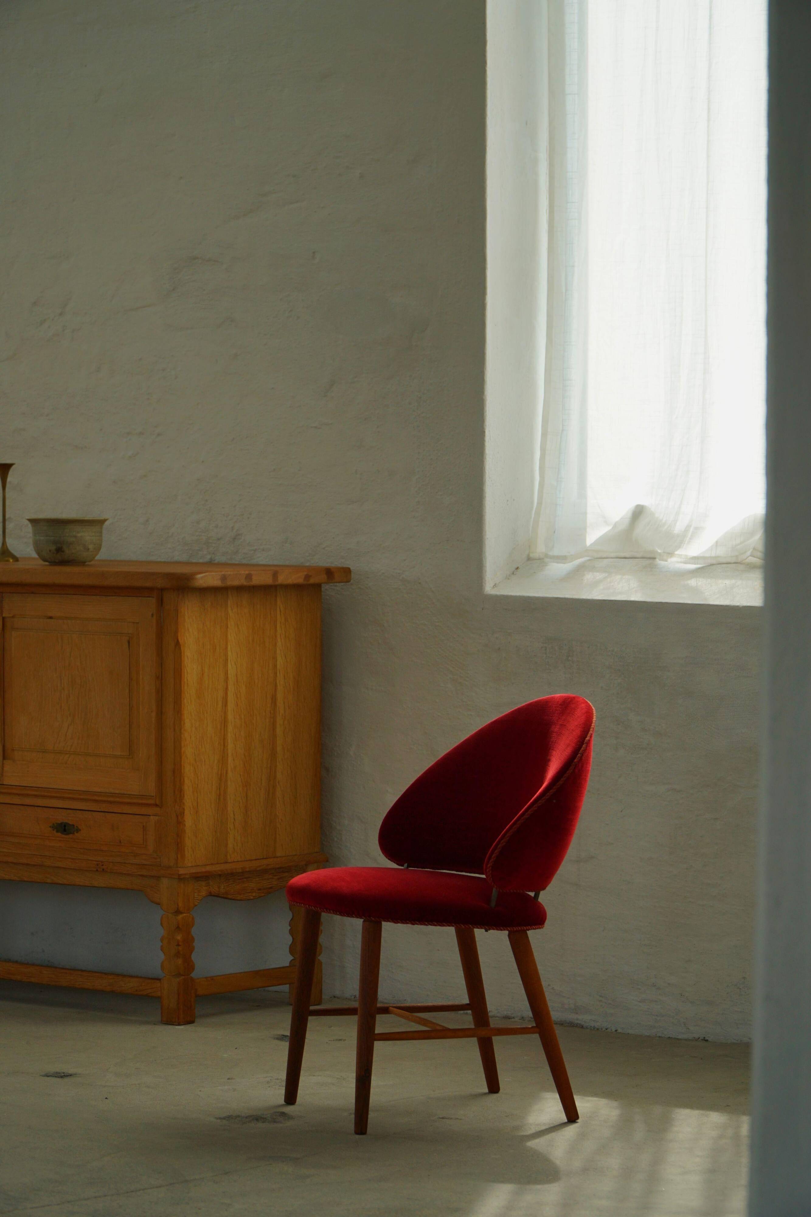 Mid-century toilet chair in oak and red velvet, by a Danish cabinetmaker, 1950s.