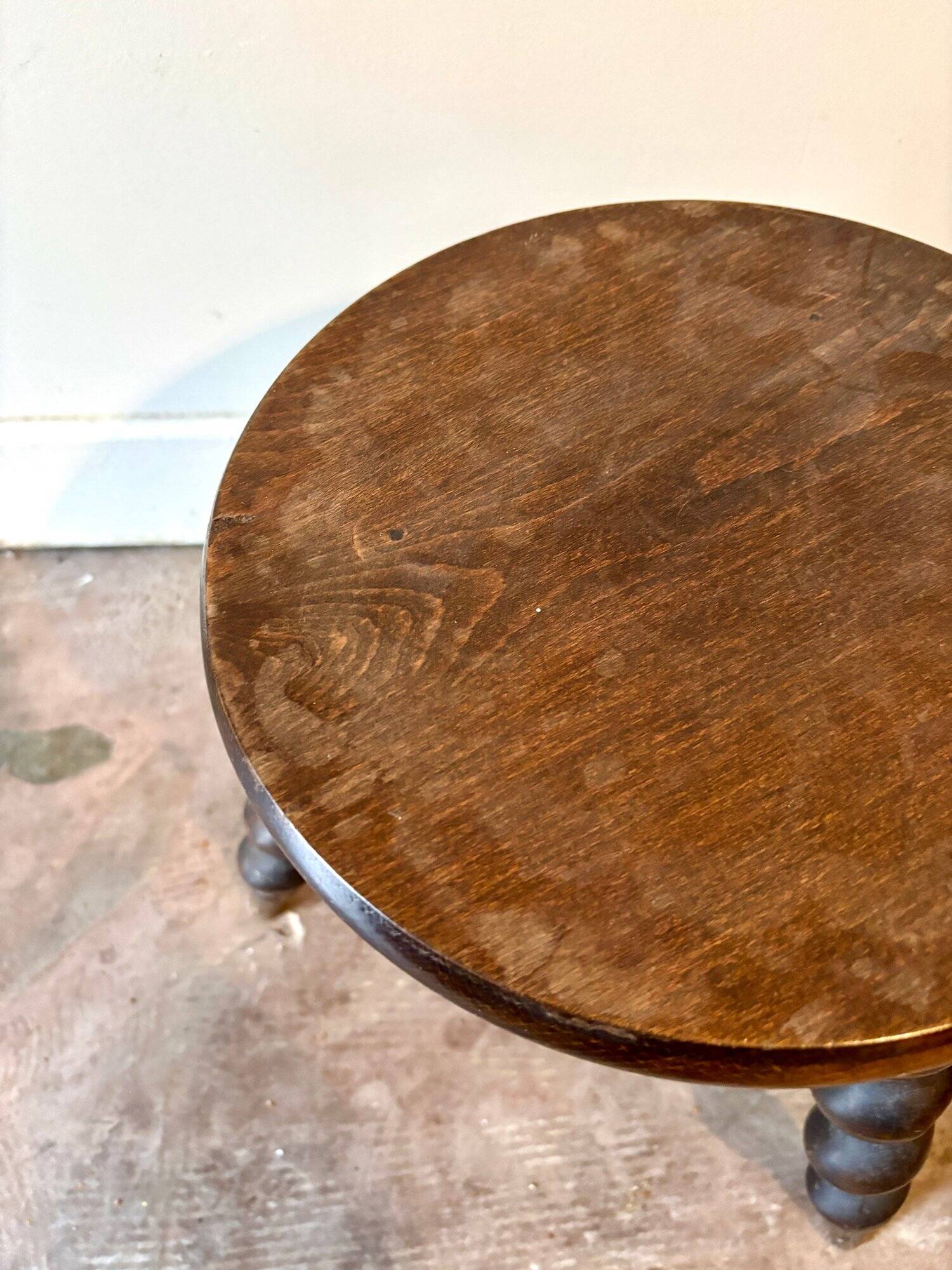 Turned wooden tripod stool