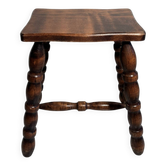 Tabouret bas vintage en bois massif et pieds tournés – 1950