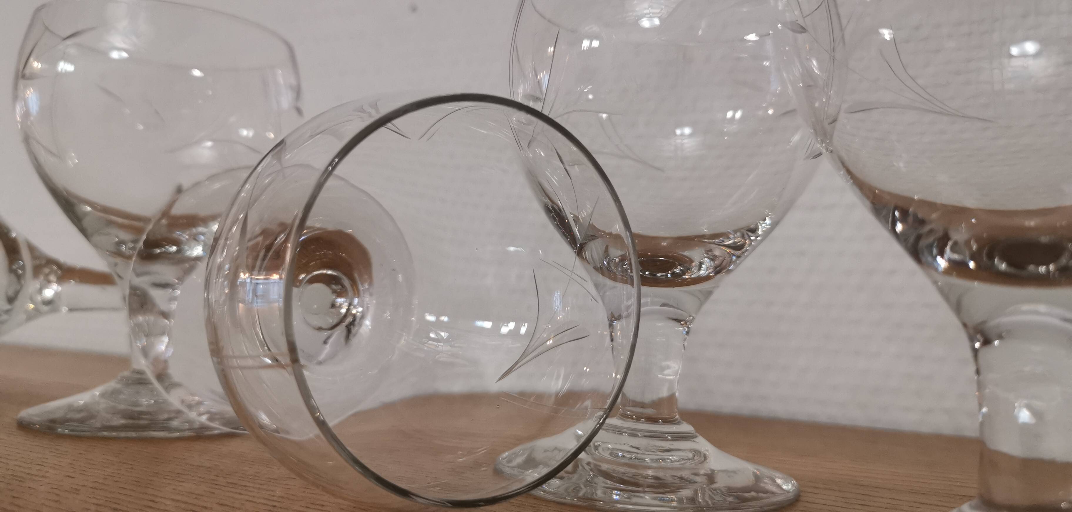 Set of 7 finely engraved vintage wine glasses