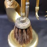 Brass fireplace set with 4 accessories.
